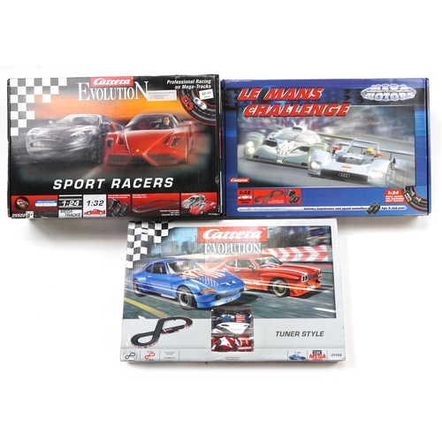 1579 - Three Carrera and Carrera Evolution 1:32 scale model slot car racing sets comprising Sport Racers 25... 