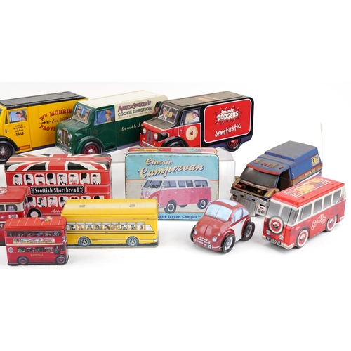 1623A - Large collection of novelty biscuit and chocolate tins in the form of motor vehicles, the largest 32... 