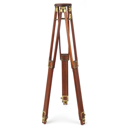 744A - Edwardian mahogany and brass folding camera tripods