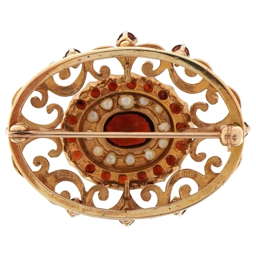 2051 - 10ct gold Bohemian garnet and seed pearl openwork brooch, 3.2cm wide, 8.5g