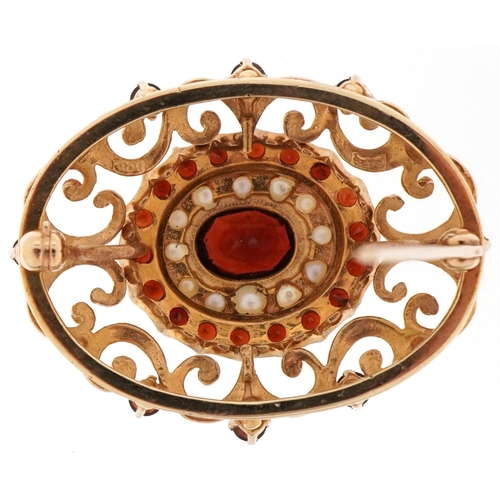 2051 - 10ct gold Bohemian garnet and seed pearl openwork brooch, 3.2cm wide, 8.5g