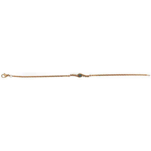 2227 - 9ct gold sapphire and diamond crossover bracelet, 18cm in length, 3.5g