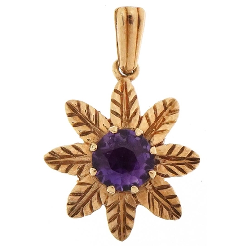 2223 - 9ct gold amethyst flower head pendant, 2.3cm high, 1.7g