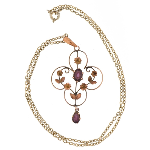 2035 - Edwardian 9ct gold purple stone openwork pendant on a yellow metal necklace, 4.5cm high and 36cm in ... 