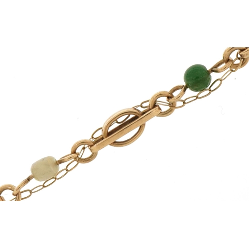 2113 - 9ct gold turquoise and seed pearl bracelet, 19cm in length, 4.0g