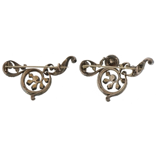 2657 - Two continental antique 800 grade silver paste brooches, each 6cm wide, total 41.7g