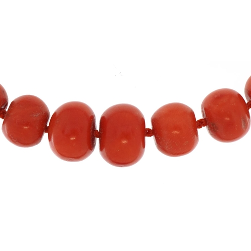 2406 - Graduated pink coral graduated bead necklace, 40cm in length, 77.5g