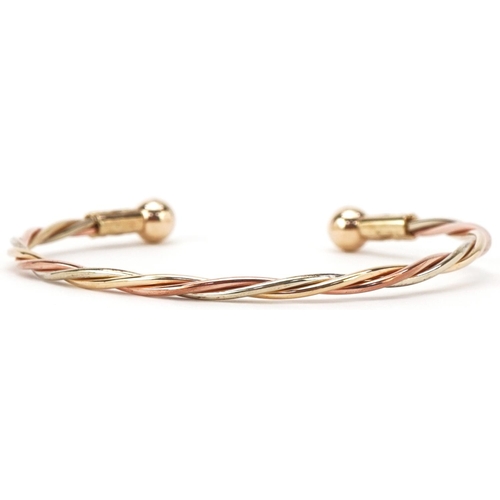 2135 - 9ct three tone gold bangle, 6.5cm wide, 4.9g