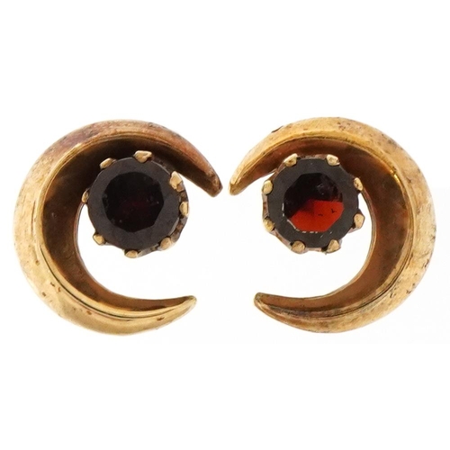 2183 - Pair of continental gold garnet moon crest stud earrings, each 11mm high, total 2.0g