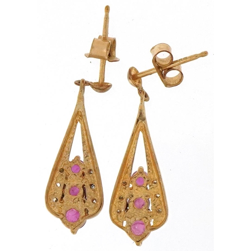 2306 - Pair of 9ct gold ruby and diamond drop earrings, each 2.3cm high, total 1.8g