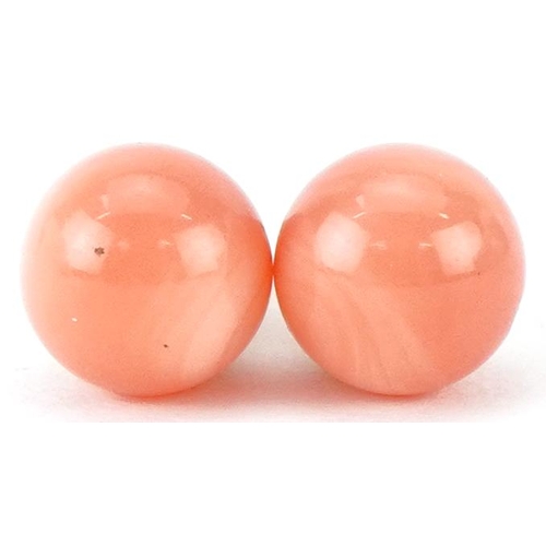 2465 - Pair of yellow metal pink coral stud earrings, each 8.0mm in diameter, total 2.0g