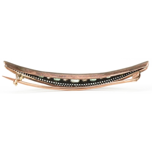 2075 - Art Deco unmarked gold emerald and diamond moon crest bar brooch, the largest diamond approximately ... 