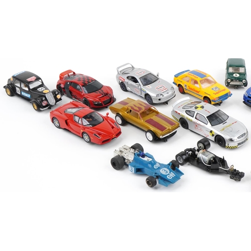 1668 - Collection of vintage and later slot cars including Scalextric, Hornby and Carrera Evolution