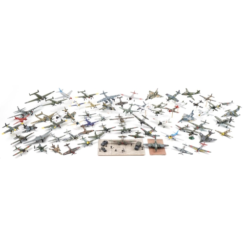 1606 - Collection of scratch built model military aircraft, the largest 30cm wide