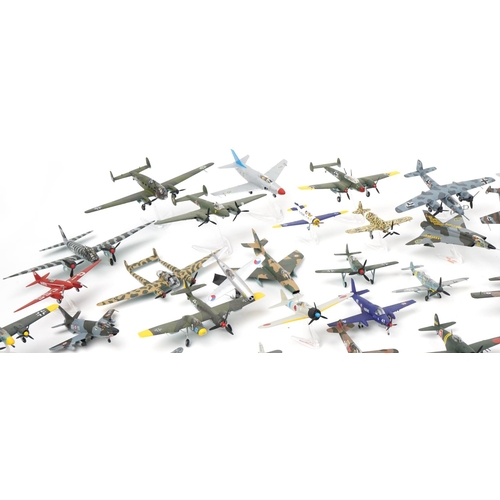 1606 - Collection of scratch built model military aircraft, the largest 30cm wide