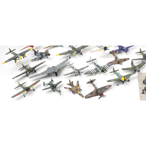 1606 - Collection of scratch built model military aircraft, the largest 30cm wide