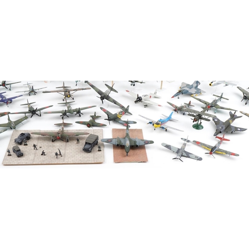 1606 - Collection of scratch built model military aircraft, the largest 30cm wide