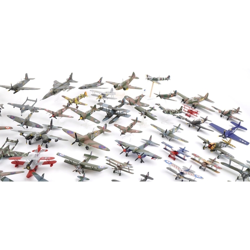 1604 - Collection of scratch built model military aircraft, the largest 30cm wide