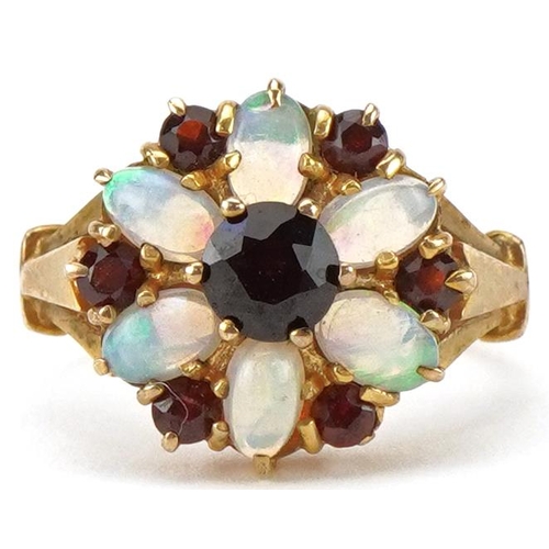 2122 - 9ct gold opal and garnet flower head ring, size M, 4.0g