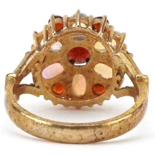 2122 - 9ct gold opal and garnet flower head ring, size M, 4.0g