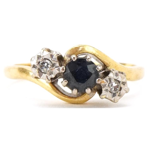 2134 - 18ct gold sapphire and diamond three stone crossover ring, the sapphire approximately 4.30mm in diam... 