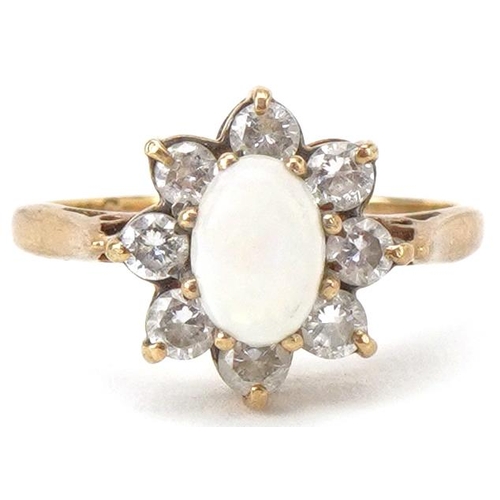 2322 - 9ct gold cabochon opal and clear stone flower head ring, size M, 2.2g