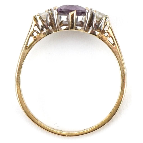 2152 - 9ct gold amethyst and clear stone three stone ring, size P, 2.2g