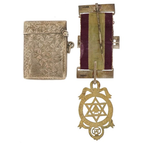 336 - Silver objects comprising floral engraved vesta, floral engraved bracelet and a masonic jewel with r... 