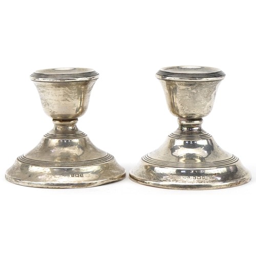 507 - Napper & Davenport, pair of George V circular silver dwarf candlesticks, Birmingham 1924, each 5.5cm... 