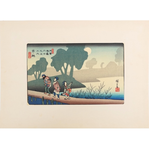 124 - Ten Japanese woodblock prints housed in a gilt folder with artists signature, each mounted, each 34c... 