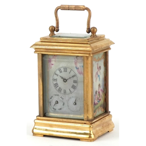 62 - Miniature brass cased carriage clock with Sevres type porcelain panels decorated with Putti, 8cm hig... 