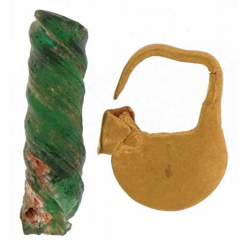 2661 - Unmarked gold padlock and a section of twisted green glass, the padlock 0.6g