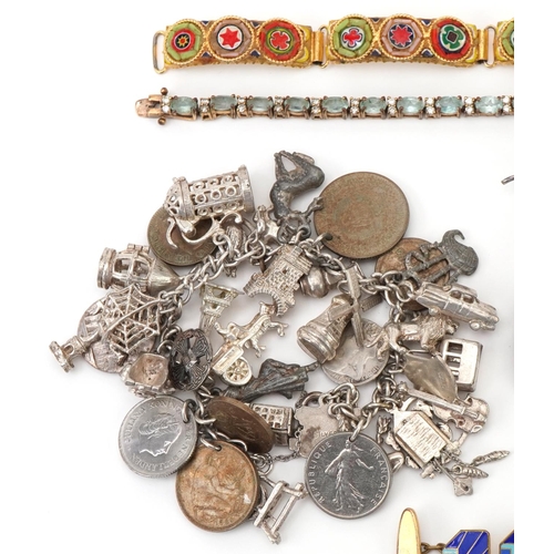 2726 - Antique and later jewellery including a heavy silver charm bracelet with a large collection of mostl... 