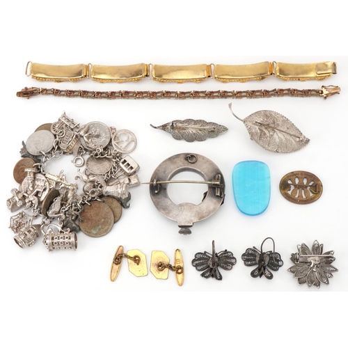 2726 - Antique and later jewellery including a heavy silver charm bracelet with a large collection of mostl... 