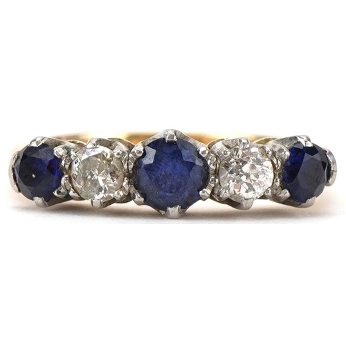 2296 - 18ct gold diamond and sapphire five stone ring, each diamond approximately 3.0mm in diameter, the ce... 