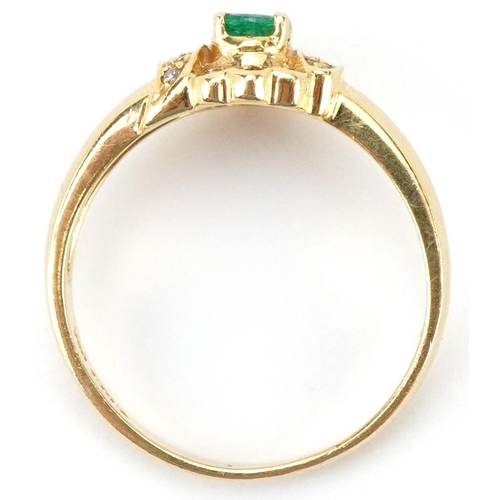 2063 - 18ct gold emerald and diamond cluster ring, size N/O, 3.2g
