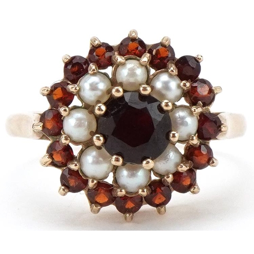 2233 - 9ct gold garnet and pearl three tier cluster ring, size O, 2.8g