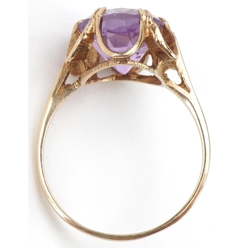 2266 - 9ct gold amethyst solitaire ring, the amethyst approximately 11.80mm x 10.80mm x 7.40mm deep, size Q... 