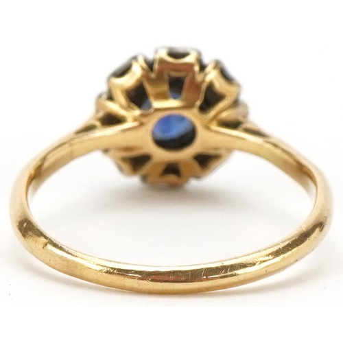 2255 - 18ct gold and platinum sapphire and diamond flower head ring, size L, 2.2g