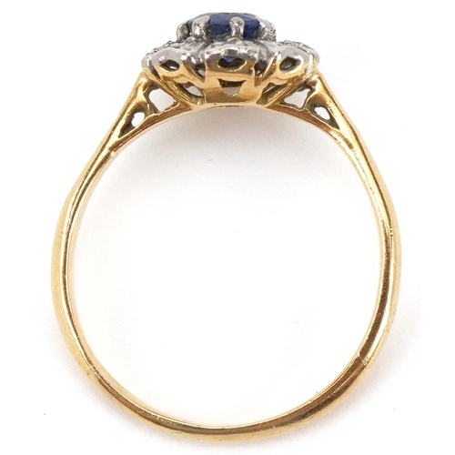 2255 - 18ct gold and platinum sapphire and diamond flower head ring, size L, 2.2g