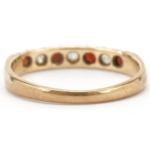 2276 - 9ct gold garnet and clear stone half eternity ring, sizes M, 1.5g