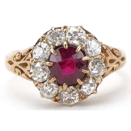 2017 - 18ct gold ruby and diamond cluster ring, total diamond weight approximately 0.90 carat, the ruby app... 