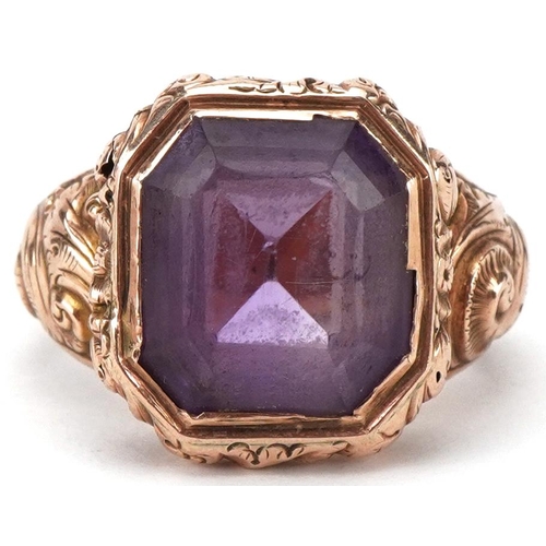 2294 - Victorian unmarked gold and yellow metal amethyst ring with ornate setting, the amethyst approximate... 