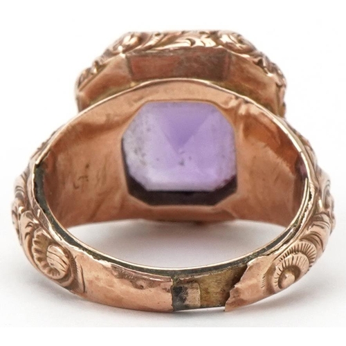 2294 - Victorian unmarked gold and yellow metal amethyst ring with ornate setting, the amethyst approximate... 