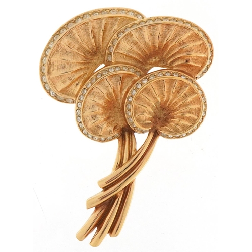 2297 - Christian Dior, gold plated and clear stone brooch in the form of palm leaves, 6.5cm high, 30.0g