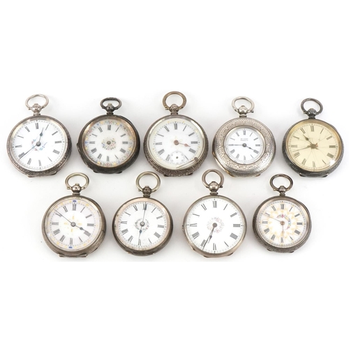 2713 - Nine ladies silver open face pocket watches, each having enamelled dial with Roman numerals, the lar... 