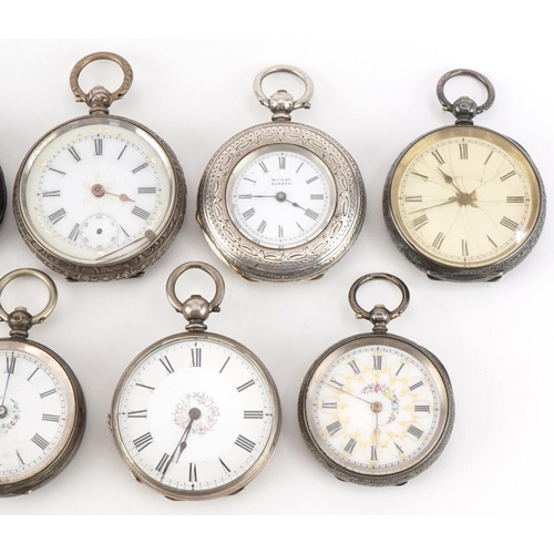 2713 - Nine ladies silver open face pocket watches, each having enamelled dial with Roman numerals, the lar... 