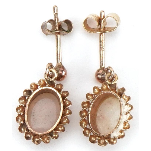 2111 - Pair of 9ct gold cabochon opal drop earrings, each 1.6cm high, total 1.4g