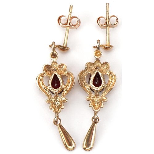 2161 - Pair of 9ct gold garnet teardrop earrings, each 3cm high, total 1.9g