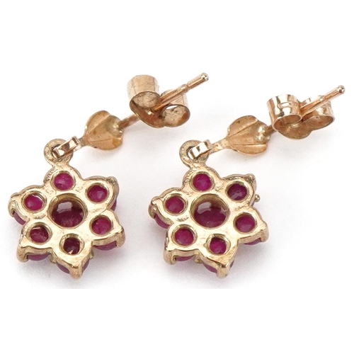 2412 - Pair of unmarked gold ruby flower head drop earrings, each 1.7cm high, total 1.4g